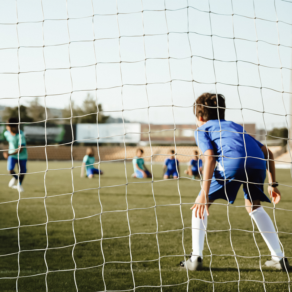Leistungsdruck: Jungs auf dem Fussballfeld.